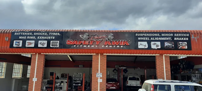 Peters Safety Kwik Fitment Centre storefront with service bays open in Richmond